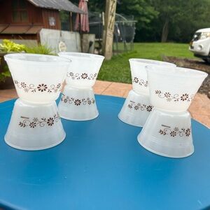 8 vintage Pyrex custard cups and one 10oz bowl. Floral design